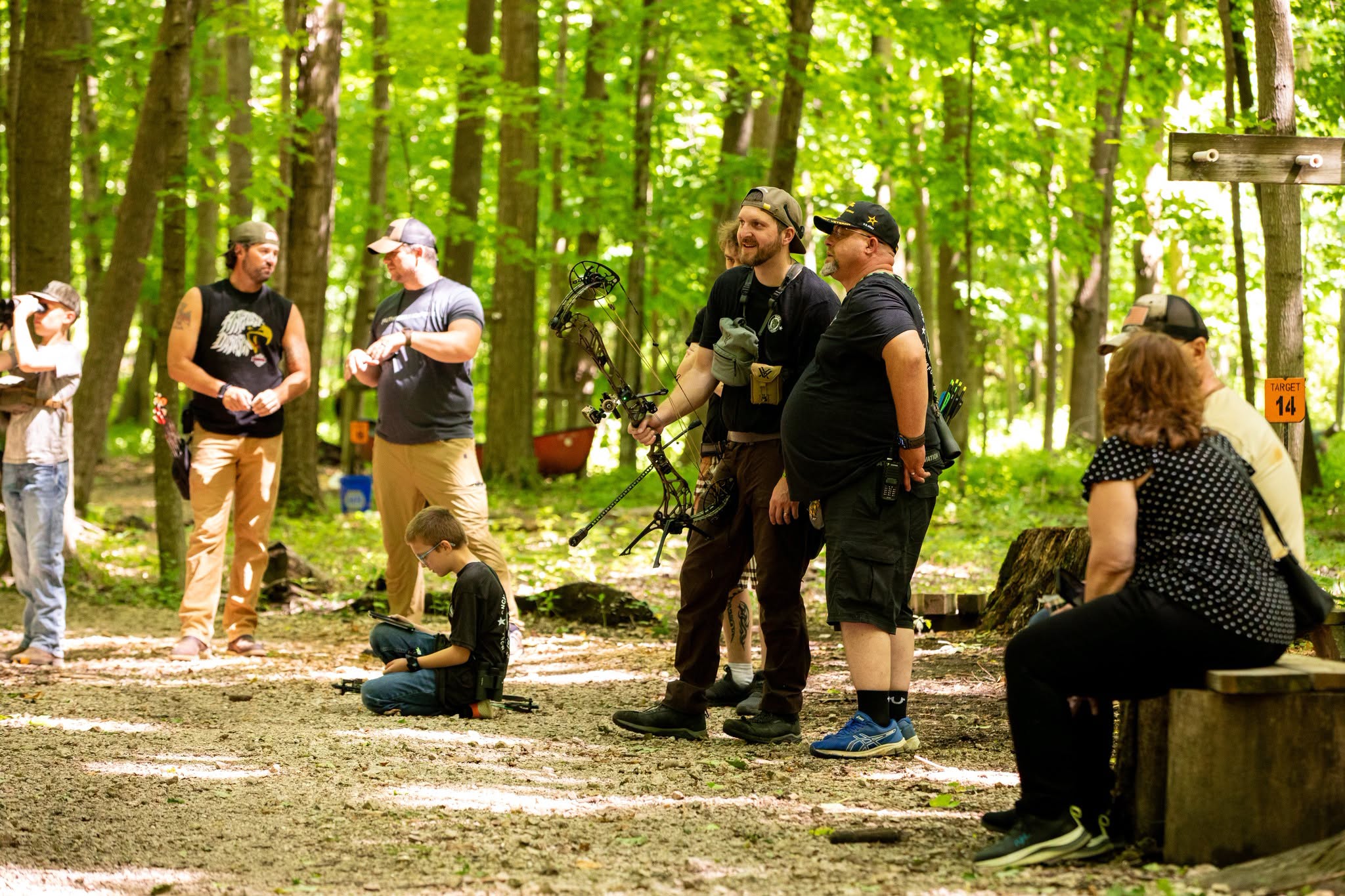Bows for Battle community gathering outdoors